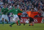 10 April 2002; Conor Gethins of Republic of Ireland in action against Nicky Hofs of Netherlands during the UEFA U19 European Championships Intermediary Round Second Leg match between Republic of Ireland and Netherlands at Turner's Cross in Cork. Photo by Aoife Rice/Sportsfile