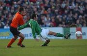 10 April 2002; Stephen Kelly of Republic of Ireland in action against Domingus Lim Duan of Netherlands during the UEFA U19 European Championships Intermediary Round Second Leg match between Republic of Ireland and Netherlands at Turner's Cross in Cork. Photo by Aoife Rice/Sportsfile