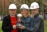 11 April 2002; Laura Foran of sponsors C&M Construction with Glen Crowe of Bohemians, left, Premier Division Player of the Year Nominee and Robbie Martin of UCD, Young Player of the Year Nominee at the announcement of the nominees for the C&M Construction / PFAI Player of the Year Awards 2002. Photo by Ray McManus/Sportsfile