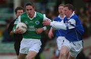 14 April 2002; Declan Sullivan of Coláiste na Sceilge is tackled by Gary Sice of St Jarlath's College during the Post Primary Schools Hogan Cup Senior A Football Championship Semi-Final match between St Jarlath's College and Coláiste na Sceilge at the Gaelic Grounds in Limerick. Photo by Matt Browne/Sportsfile