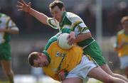 14 April 2002; Donal Curtis of Meath is tackled by Séamus Moynihan of Kerry during the Allianz National Football League Division 2 Semi-Final match between Meath and Kerry at the Gaelic Grounds in Limerick. Photo by Matt Browne/Sportsfile