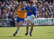 14 April 2002; Peter Reilly of Cavan in action against Jimmy O'Neill of Roscommon during the Allianz National Football League Semi-Final match between Cavan and Roscommon at Cusack Park in Mullingar, Westmeath. Photo by Aoife Rice/Sportsfile