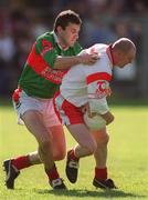 14 April 2002; Chris Lawn of Tyrone in action against James Horan of Mayo during the Allianz National Football League Division 1 Semi-Final match between Mayo and Tyrone at Brewster Park in Enniskillen, Fermanagh. Photo by Damien Eagers/Sportsfile