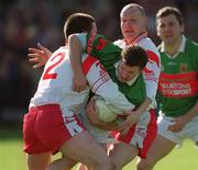14 April 2002; David Nestor of Mayo in action against Conor Gormley, 2, and Chris Lawn of Tyrone during the Allianz National Football League Division 1 Semi-Final match between Mayo and Tyrone at Brewster Park in Enniskillen, Fermanagh. Photo by Damien Eagers/Sportsfile
