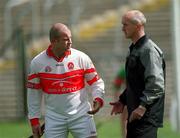 14 April 2002; Derry manager Dominic McKinley in conversation with Geoffrey McGonagle prior to the Allianz National Hurling League Division 1 Relegation Play-Off match between Dublin and Derry at Brewster Park in Enniskillen, Fermanagh. Photo by Damien Eagers/Sportsfile