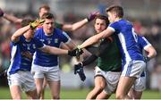 19 March 2017; Tom Parsons of Mayo in action against Niall Clerkin, left, and Killian Clarke of Cavan during the Allianz Football League Division 1 Round 5 match between Mayo and Cavan at Elverys MacHale Park in Castlebar, Co Mayo. Photo by David Maher/Sportsfile