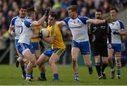 19 March 2017; Tom Featherston of Roscommon in action against Dessie Ward, left, and Darren Hughes of Monaghan during the Allianz Football League Division 1 Round 5 match between Monaghan and Roscommon at Páirc Grattan in Inniskeen, Co Monaghan. Photo by Piaras Ó Mídheach/Sportsfile