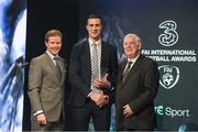 19 March 2017; Stephen Kelly of Newmarket Celtic is presented with the Junior International Player of the Year by Gavin McAllister PR & Sponsorship Manager of Three Ireland (left) and FAI President Tony Fitzgerald during the Three FAI International Soccer Awards at RTE Studios in Donnybrook, Dublin. Photo by Brendan Moran/Sportsfile