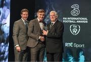 19 March 2017; George Poynton of Bohemians is presented with the U19 International Player of the Year by Gavin McAllister PR & Sponsorship Manager of Three Ireland and FAI President Tony Fitzgerald during the Three FAI International Soccer Awards at RTE Studios in Donnybrook, Dublin. Photo by Brendan Moran/Sportsfile