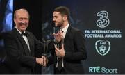 19 March 2017; Robbie Brady is presented with the Senior International Player of the Year by Minister for Transport, Tourism and Sport Shane Ross, T.D, during the Three FAI International Soccer Awards at RTE Studios in Donnybrook, Dublin. Photo by Brendan Moran/Sportsfile