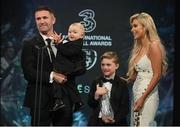 19 March 2017; Former Republic of Ireland captain and record goalscorer Robbie Keane, who was inducted into the Hall of Fame, with wife Claudine and sons Hudson left, and Robert Jnr, during the Three FAI International Soccer Awards at RTE Studios in Donnybrook, Dublin. Photo by Brendan Moran/Sportsfile