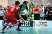 19 March 2017; Team Ireland's John Paul Shaw, a member of Shoot’n’Stars Special Olympics Club, from Longford Town, Co. Longford, in action against Sebastian Hussler, Austria, during the Team Ireland 2 v Austria 2 Floorball Round Robin game at the 2017 Special Olympics World Winter Games in the Messe Graz Center, Graz, Austria. Photo by Ray McManus/Sportsfile