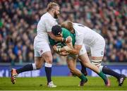 18 March 2017; Robbie Henshaw of Ireland is tackled by Joe Marler, left, and Joe Launchbury of England during the RBS Six Nations Rugby Championship match between Ireland and England at the Aviva Stadium in Lansdowne Road, Dublin. Photo by Sam Barnes/Sportsfile