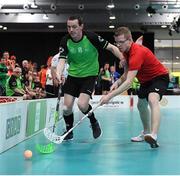 19 March 2017; Team Ireland's John Paul Shaw, a member of Shoot’n’Stars Special Olympics Club, from Longford Town, Co. Longford, in action against Sebastian Kroger, Germany, during the Team Ireland T2 v Germany  - Floorball Round Robin game at the 2017 Special Olympics World Winter Games in the Messe Graz Center, Graz, Austria. Photo by Ray McManus/Sportsfile