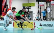 20 March 2017; Team Ireland's William McGrath, a member of Waterford Special Olympics Club, from Kilmacthomas, Co. Waterford, in action against Sandro Sax, Switzerland, during the Team Ireland v Switzerland - Floorball Round Robin game at the 2017 Special Olympics World Winter Games in the Messe Graz Center, Graz, Austria. Photo by Ray McManus/Sportsfile