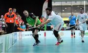 20 March 2017; Team Ireland's Michael Minogue, a member of Tipperary Special Olympics Club, from Ballingarry, Co. Limerick, in action against Armend Krasniqi, Switzerland, during the Team Ireland v Switzerland - Floorball Round Robin game at the 2017 Special Olympics World Winter Games in the Messe Graz Center, Graz, Austria. Photo by Ray McManus/Sportsfile