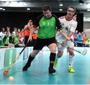 19 March 2017; Team Ireland's George Fitzgerald, a member of Waterford Special Olympics Club, from John’s Hill, County Waterford, in action against Stefan Fassler, Switzerland, during the Team Ireland v Switzerland - Floorball Round Robin game at the 2017 Special Olympics World Winter Games in the Messe Graz Center, Graz, Austria. Photo by Ray McManus/Sportsfile