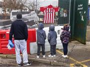 20 March 2017; Members of the public pay their respect as a Derry City FC jersey is pinned to the fence outside the Brandywell Stadium, which is currently under construction, to the late Derry City captain Ryan McBride, who passed away suddenly at the age of 27. The Brandywell Stadium, Derry. Photo by Oliver McVeigh/Sportsfile