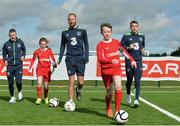 21 March 2017; Republic of Ireland Internationals, from left, Jonathan Hayes, David Meyler and Seamus Coleman, with Spar Ambassadors Síofra Nic Oireachtaigh, left, and Roibeard Ó Gallchóir in attendance during the SPAR FAI Retailers Masterclass at FAI pitches, National Sports Campus, in Abbotstown, Dublin 15. SPAR provided more than 70 local retailers’ children with the opportunity to train with Republic of Ireland players, at the teams training camp in the National Sports Campus in advance of the Republic of Ireland vs Wales on Friday. SPAR is the Official Convenience Retail Partner of the FAI and sponsors of the SPAR FAI Primary School 5s Programme, the largest primary school’s competition in the country with 28,256 participants. Photo by Sam Barnes/Sportsfile