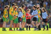 28 August 2011; The Donegal and Dublin teams shake hands after the game. Go Games Exhibition - Sunday 21st August 2011, Croke Park, Dublin. Picture credit: Ray McManus / SPORTSFILE