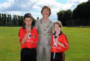 28 August 2011; INTO President Noreen Flynn with referees Jamie Lynch, and Lauren Cole, both from St. Dallan's P.S., Warrenpoint, Co. Down. Go Games Exhibition - Sunday 21st August 2011, Croke Park, Dublin. Picture credit: Dáire Brennan / SPORTSFILE
