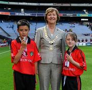 28 August 2011; INTO President Noreen Flynn with referees Jamie Lynch, and Lauren Cole, both from St. Dallan's P.S., Warrenpoint, Co. Down. Go Games Exhibition - Sunday 21st August 2011, Croke Park, Dublin. Picture credit: Dáire Brennan / SPORTSFILE