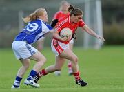 27 August 2011; Rhona Ni Bhuachalla, Cork, in action against Patricia Fogarty, Laois. TG4 All-Ireland Ladies Senior Football Championship Semi-Final, Cork v Laois, Leahy Park, Cashel, Co. Tipperary. Picture credit: Brian Lawless / SPORTSFILE