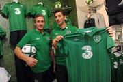 30 August 2011; Republic of Ireland players, Liam Lawrence, left, and Stephen Kelly pictured after trading in their old Ireland jersey to the Three Trade in Scheme in Champion, Jervis Street. Three is asking Irish fans to Go Green With Pride and trade in their old Republic of Ireland football jerseys in any Champion store nationwide and get €20 off the new home jersey. The traded in jerseys will be donated to Friends In Ireland, a charity founded by Marian Finucane. The scheme will run until September 30th. Champion Sports, Jervis Centre, Dublin. Picture credit: Brian Lawless / SPORTSFILE