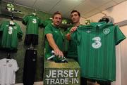 30 August 2011; Republic of Ireland players, Liam Lawrence, left, and Stephen Kelly pictured trading in their old Ireland jersey to the Three Trade in Scheme in Champion, Jervis Street. Three is asking Irish fans to Go Green With Pride and trade in their old Republic of Ireland football jerseys in any Champion store nationwide and get €20 off the new home jersey. The traded in jerseys will be donated to Friends In Ireland, a charity founded by Marian Finucane. The scheme will run until September 30th. Champion Sports, Jervis Centre, Dublin. Picture credit: Brian Lawless / SPORTSFILE