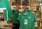 30 August 2011; Republic of Ireland players Liam Lawrence, left, and Stephen Kelly pictured trading in their old Ireland jersey to the Three Trade in Scheme in Champion, Jervis Street. Three is asking Irish fans to Go Green With Pride and trade in their old Republic of Ireland football jerseys in any Champion store nationwide and get €20 off the new home jersey. The traded in jerseys will be donated to Friends In Ireland, a charity founded by Marian Finucane. The scheme will run until September 30th. Champion Sports, Jervis Centre, Dublin. Picture credit: Brian Lawless / SPORTSFILE