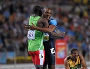 30 August 2011; Kirani James, Grenada, is congratulated by second place LaShawn Merritt, USA, right, after winning the Men's 400m Final event in a time 44.60. IAAF World Championships - Day 4, Daegu Stadium, Daegu, Korea. Picture credit: Stephen McCarthy / SPORTSFILE