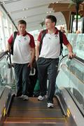 30 August 2011; Ireland's Brian O'Driscoll and Ronan O'Gara, left, prior to departure for New Zealand for the 2011 Rugby World Cup. Ireland Rugby Squad Departure, Dublin Airport, Dublin. Picture credit: Pat Murphy / SPORTSFILE