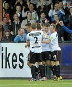 30 August 2011; Mark Quigley, Dundalk, is congratulated after scoring his side's second goal by team-mates, from left, Dean Bennett, Simon Madden and Keith Ward. FAI Ford Cup 4th Round Replay, Dundalk v Drogheda United, Oriel Park, Dundalk, Co Louth. Photo by Sportsfile