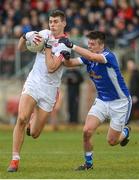 12 March 2017; Padraig McNulty of Tyrone in action against Gerard Smith of Cavan during the Allianz Football League Division 1 Round 3 Refixture match between Tyrone and Cavan at Healy Park in Omagh, Co. Tyrone. Photo by Oliver McVeigh/Sportsfile