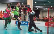 22 March 2017; Team Ireland's John Paul Shaw, a member of Shoot’n’Stars Special Olympics Club, from Longford Town, Co. Longford in action against Marie-Paule Gouedji, left, and goalkeeper Moussa Dosso, Cote d'Ivoire, during a quarter final in the Floorball Competition at the Floorball quarter final game Ireland '2' v Cote d'Ivoire at the 2017 Special Olympics World Winter Games in the Messe Graz Center, Graz, Austria. Photo by Ray McManus/Sportsfile