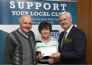 17 March 2017; Lúthchleas Gael Aogán Ó Fearghail presents Emmet and Nuala Quinn from Pomeroy Plunketts, Tyrone, who won a &quot;Shopping Voucher to the value of €1,000&quot; during the presentation of prizes to the winners of the GAA National Club Draw at Croke Park in Dublin. Uachtarán Chumann Lúthchleas Gael Aogán Ó Fearghail Photo by Ray McManus/Sportsfile