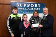 17 March 2017; Lúthchleas Gael Aogán Ó Fearghail presents Cathriona Brady and her two children from Simonstown Gaels Navan Co. Meath, who won a &quot;All Ireland Finals Cororate package&quot; during the presentation of prizes to the winners of the GAA National Club Draw at Croke Park in Dublin. Uachtarán Chumann Lúthchleas Gael Aogán Ó Fearghail Photo by Ray McManus/Sportsfile
