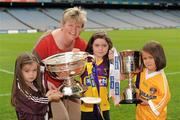 30 August 2011; Camogie Association President Joan O’Flynn urged Camogie and Gaelic games fans to come and join in the celebration of Camogie’s 80th championship final by attending the All Ireland Finals in association with RTÉ Sport at Croke Park on Sunday September 11th. Pictured at the announcement of the birthday celebrations are Jenna Boylan, three years, left, from The Naul, Co. Dublin, Camogie Association President Joan O’Flynn, Millie Boylan, six years, from The Naul, Co. Dublin, and Deirdre Gaughan, six years, from Ashbourne, Co. Meath. Launch of the All-Ireland Camogie Championship Finals, Croke Park, Dublin. Picture credit: Ray McManus / SPORTSFILE