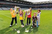 30 August 2011; Camogie Association President Joan O’Flynn urged Camogie and Gaelic games fans to come and join in the celebration of Camogie’s 80th championship final by attending the All Ireland Finals in association with RTÉ Sport at Croke Park on Sunday September 11th. Pictured at the announcement of the birthday celebrations are, from left to right, Patrick Boylan, six years, from The Naul, Co. Dublin, Jenna Boylan, three years, from The Naul, Co. Dublin, Millie Boylan, six years, The Naul, Co. Dublin, Padraig Gaughan, six years, from Ashbourne, Co. Meath, and Deirdre Gaughan, six years, from Ashbourne, Co. Meath. Launch of the All-Ireland Camogie Championship Finals, Croke Park, Dublin. Picture credit: Ray McManus / SPORTSFILE