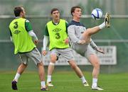 31 August 2011; Republic of Ireland's Kevin Foley in action against his team-mates Aiden McGeady, left, and Stephen Ward during squad training ahead of their EURO 2012 Championship Qualifier against Slovakia on Friday. Republic of Ireland Squad Training, Gannon Park, Malahide. Picture credit: David Maher / SPORTSFILE