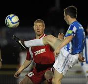 31 August 2011; John Reilly, Monaghan United, in action against Richie Ryan, Sligo Rovers. FAI Ford Cup 4th Round Replay, Monaghan United  v Sligo Rovers, Gortakeegan, Co. Monaghan. Picture credit: Oliver McVeigh / SPORTSFILE