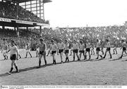 25 September 1977; Dublin captain Tony Hanahoe leads his team during the parade. All Ireland GAA Senior Football Championship Final, Dublin v Armagh, Croke Park, Dublin. Picture credit: Connolly Collection  / SPORTSFILE