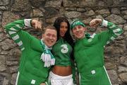 2 September 2011; Model Georgia Salpa with fans Chris Foy, Castlebar, Co. Mayo and Sean Walsh, right, from Straide, Co. Mayo at the Aviva Stadium where they were giving out free jerseys to fans as part of Three’s ‘Go Green with Pride’ campaign that is giving Irish fans the chance to trade in their old Republic of Ireland football jerseys in any Champion Sports store nationwide and get €20 off the brand new Republic of Ireland home jersey. The traded in jerseys will be collected and donated to Friends In Ireland, a charity founded by Marian Finucane that cares for orphans and vulnerable children affected by HIV/AIDS in South Africa. Aviva Stadium, Lansdowne Road, Dublin. Photo by Sportsfile