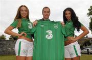 2 September 2011; Former Republic of Ireland star Jason McAteer, who scored the famous winning goal against Holland to secure a place at the 2002 World Cup ten years ago this week, with models Georgia Salpa and Daniella Moyles at the Aviva Stadium where they were giving out free jerseys to fans as part of Three’s ‘Go Green with Pride’ campaign that is giving Irish fans the chance to trade in their old Republic of Ireland football jerseys in any Champion Sports store nationwide and get €20 off the brand new Republic of Ireland home jersey. The traded in jerseys will be collected and donated to Friends In Ireland, a charity founded by Marian Finucane that cares for orphans and vulnerable children affected by HIV/AIDS in South Africa. Aviva Stadium, Lansdowne Road, Dublin. Photo by Sportsfile