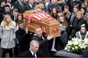 23 March 2017; Derry City players carry the coffin from the chapel at the funeral of Ryan McBride, the late Derry City captain who passed away suddenly at the age of 27, at St Columba's Church in Derry. Photo by Oliver McVeigh/Sportsfile