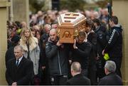 23 March 2017; Ger Doherty, left, and Derry City players carry the coffin from the chapel at the funeral of Ryan McBride, the late Derry City captain who passed away suddenly at the age of 27, at St Columba's Church in Derry. Photo by Oliver McVeigh/Sportsfile
