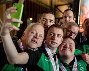24 March 2017; Team Ireland's Thomas Caulfield, a member of Stewartscare Special Olympics Club, from Ballyfermot, Dublin, takes a selfie with his Ireland T2 team mates, Matthew Colgan, a member of Estuary Centre Special Olympics Club, from Swords, Co. Dublin, Lorcan Byrne, a member of Stewartscare Special Olympics Club, from Ballyfermot, Dublin, Raymond McClearn, a member of Loughrea Training Centre Special Olympics Club, from Loughrea, Co. Galway, Patrick Tunstead, a member of Estuary Centre Special Olympics Club, from Julianstwon, Co. Meath, and Lee Ryan Byrne, a member of Sports Club 15 Special Olympics Club, from Donaghmede, Dublin, following the presentations for the Floorball competitions at the 2017 Special Olympics World Winter Games in the Messe Graz Center, Graz, Austria. Photo by Ray McManus/Sportsfile