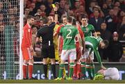 24 March 2017; Gareth Bale of Wales is shown a yellow card by referee Nicola Rizzoli during FIFA World Cup Qualifier Group D match between Republic of Ireland and Wales at the Aviva Stadium in Dublin. Photo by Brendan Moran/Sportsfile