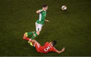 24 March 2017; (EDITORS NOTE: Image contains graphic content.) Seamus Coleman of Republic of Ireland is tackled by Neil Taylor of Wales during the FIFA World Cup Qualifier Group D match between Republic of Ireland and Wales at the Aviva Stadium in Dublin. Photo by Stephen McCarthy/Sportsfile