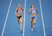 28 August 2011; Lee McConnell, Great Britain, and Marta Milani, Italy, in action during their Semi-Final of the Women's 400m event. IAAF World Championships - Day 2, Daegu Stadium, Daegu, Korea. Picture credit: Stephen McCarthy / SPORTSFILE
